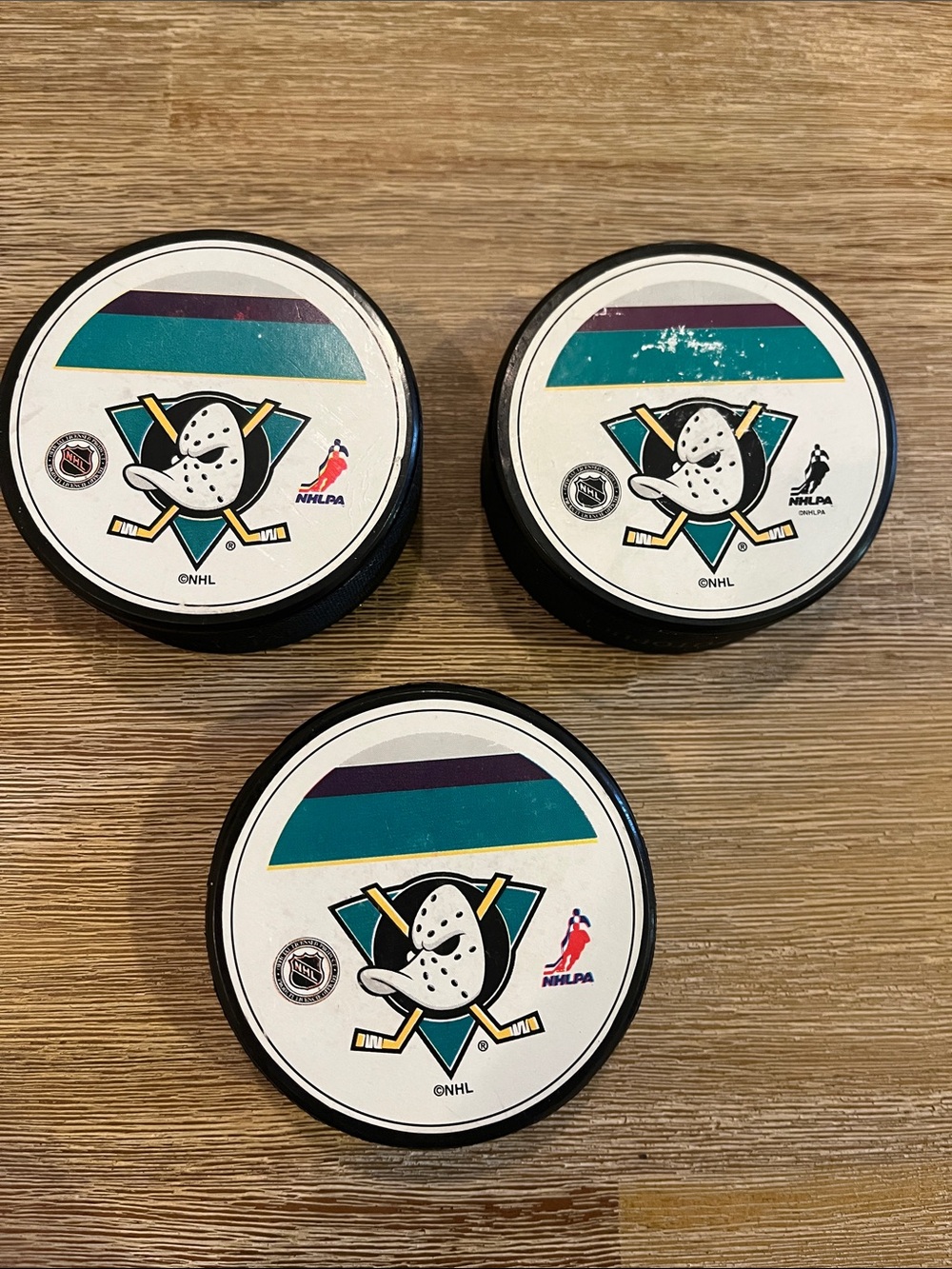 NHL Mighty Ducks Hockey Pucks